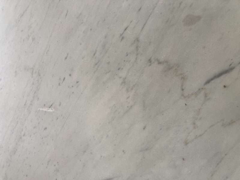 Piano in marmo arabescato di una tavola da pranzo
